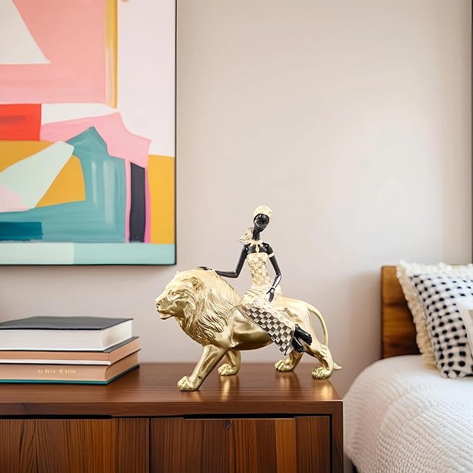 African Woman Riding Lion Statue – Gold Resin Sculpture for Home Decor, African Queen Figurine with Tribal Pattern, Cultural Art Decor for Living Room, Shelf, Office, or Gift
